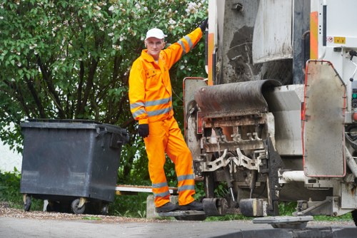 Professional removing garden debris